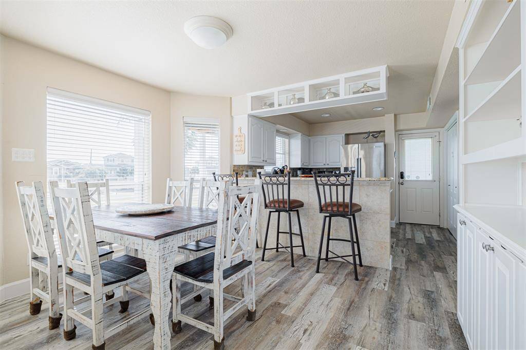 The view of the dining room and the kitchen
