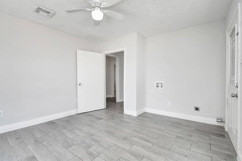 Utility room with small closet