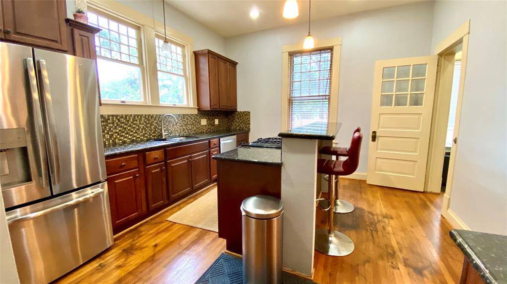 Remodeled kitchen with granite and stainless appliances