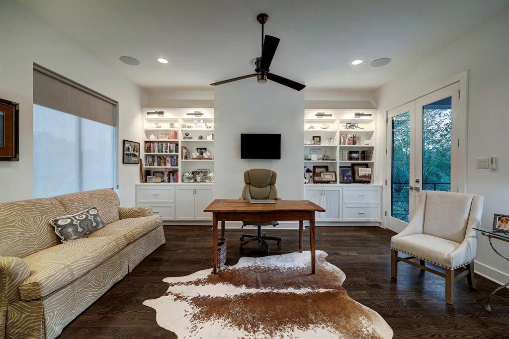 Great work space with mini refrigerator space, upper and lower storage. Just adjacent to dedicated library/study.