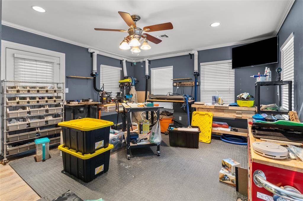 Currently seller uses this bonus room as his workshop.  This room has access to side street, back yard and kitchen