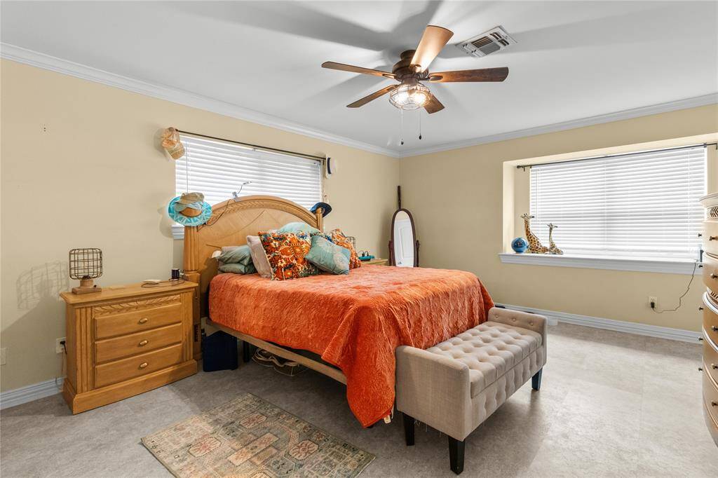 Primary bedroom with bay window, large closet and primary bathroom (shower only)
