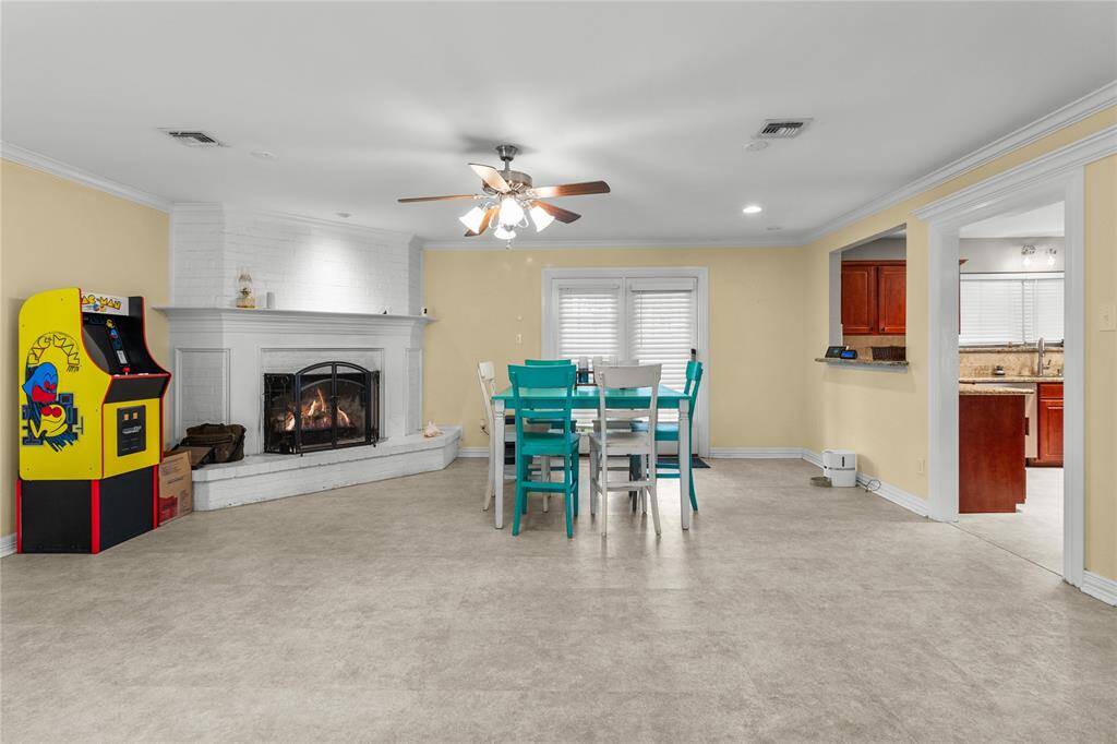 Gas fireplace in family room, pass through bar from kitchen an life proof flooring recently installed.