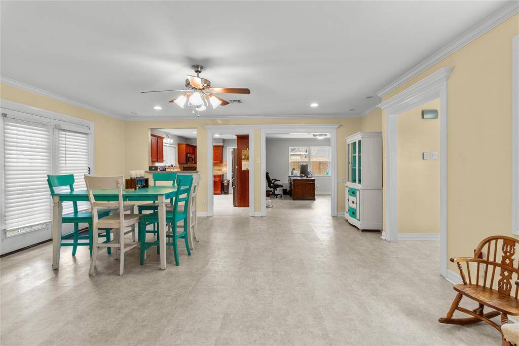 Enormous family room with access to side yard and other living areas