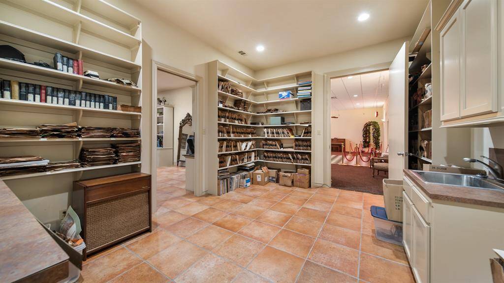 This is the library area of the home that can hold books, records, or any other collectables.  There is a 8ft door leading into the museum area of the home.
