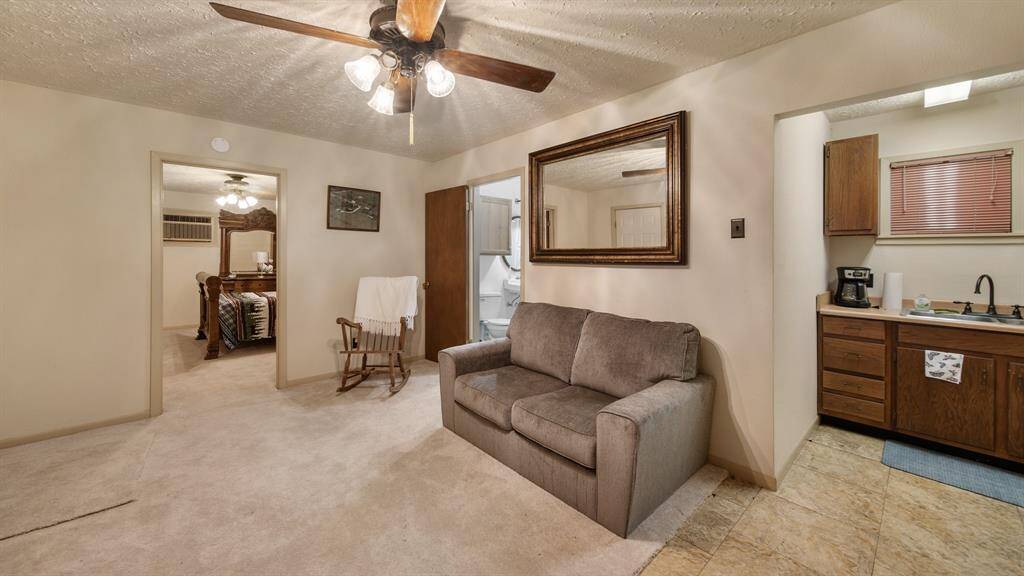 Living room space and kitchenette in the guest house.