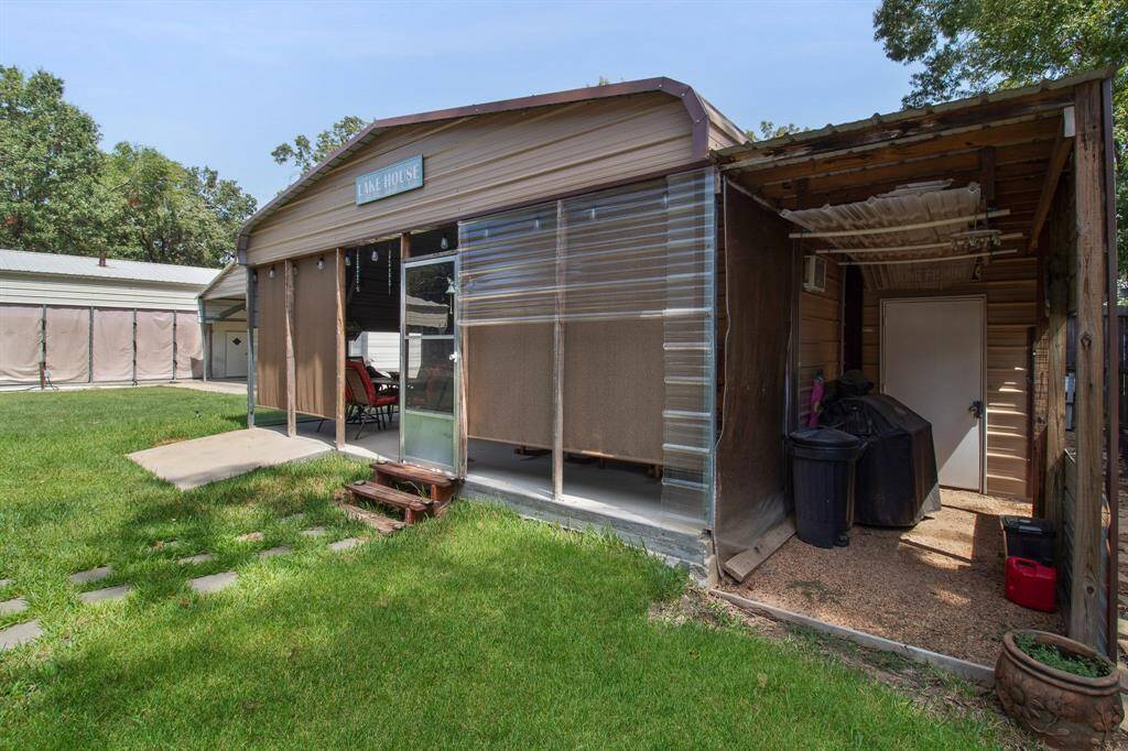 Convenient storage shed adjacent to the house.