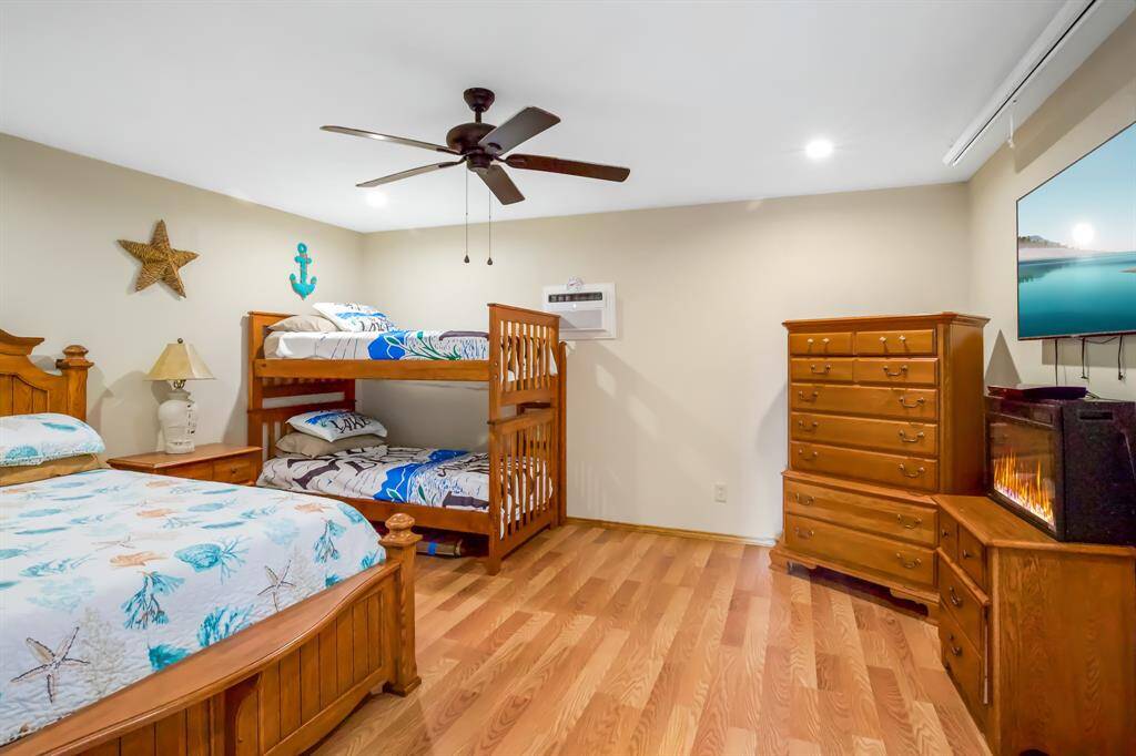 Generously-sized, serene bedroom with ample space for furnishings.