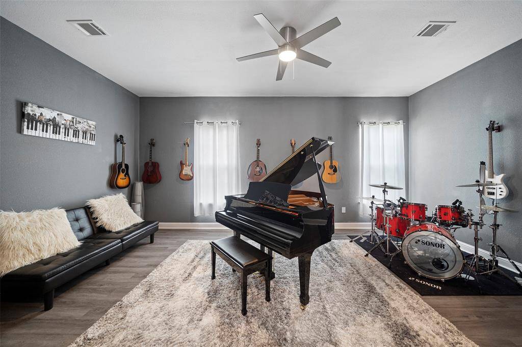 Unique room right outside the living room just perfect for an office or playroom.