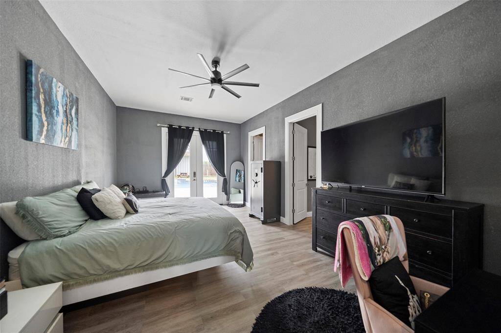 Master bedroom that opens up to the pool.
