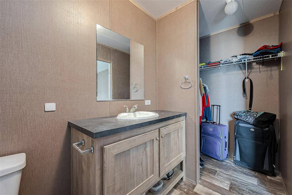 Walk In Closet In Primary Bathroom