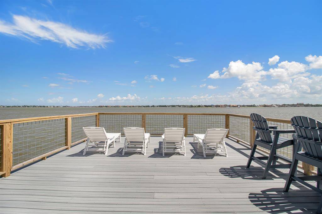 Third story deck lounging area with unbeatable view of Clear Lake.