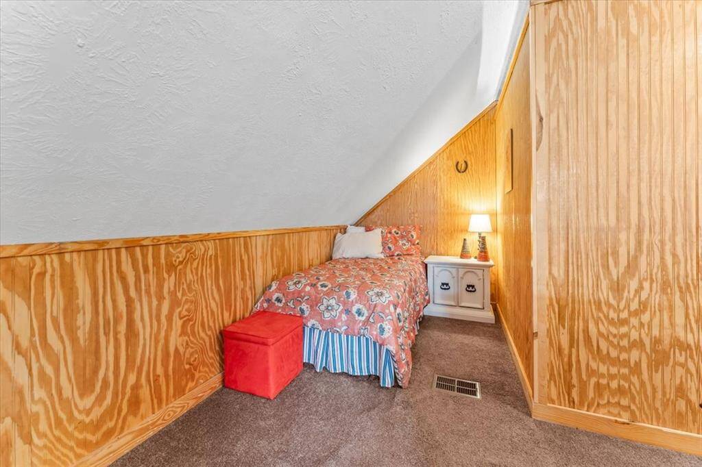 This loft features lots of sleeping options for guest. Currently they have 3-twin beds and a desk.
