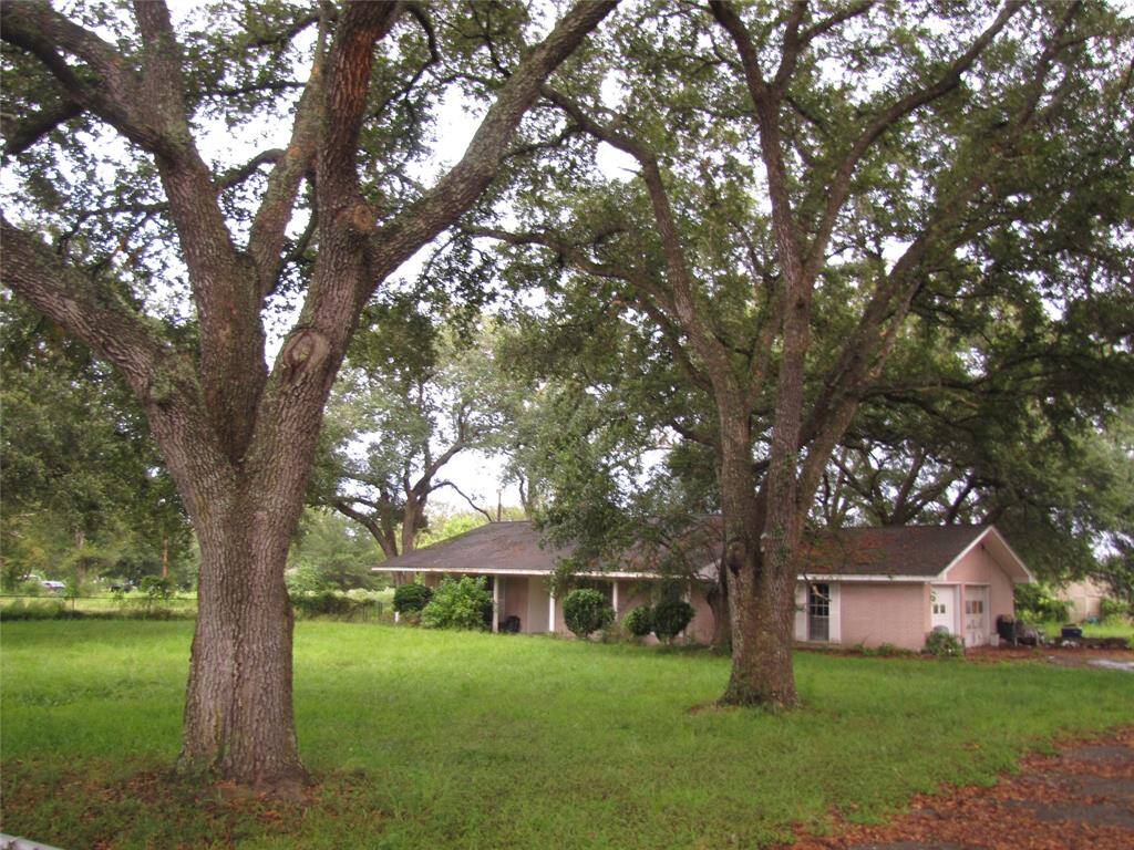 No value is given to the house, only to the property! This 2.5 +/- acres is beautiful with mature trees. Great place for residence or bring your business.