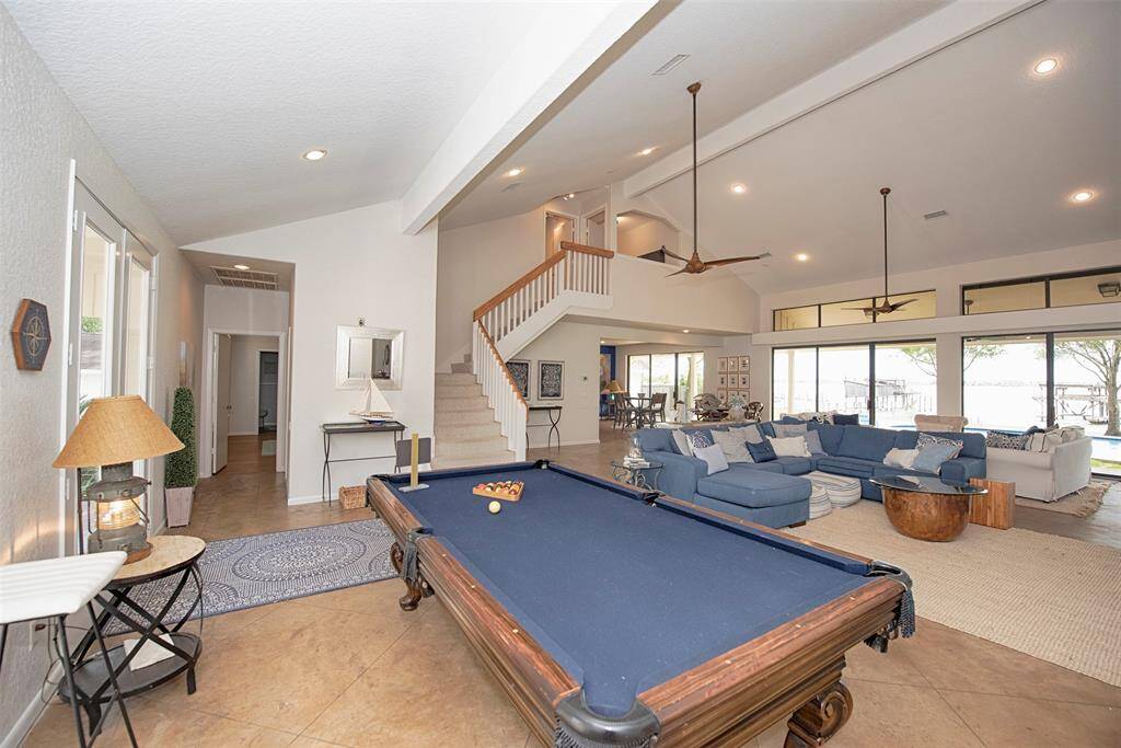 Open concept living area in center of house and open to kitchen with amazing waterviews!
