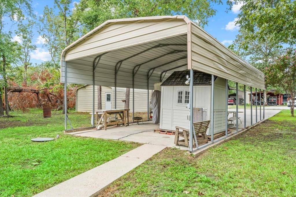 Storage building for yard tools and fishing poles.
