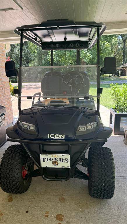 The home includes a convenient electric golf cart.