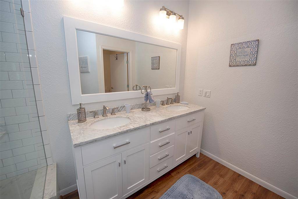 Mater bedroom 1 En Suite bathroom with double vanity and great storage for your personal items.