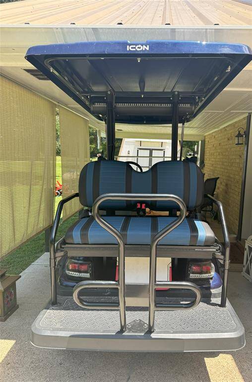 A view from the back of the golf cart.