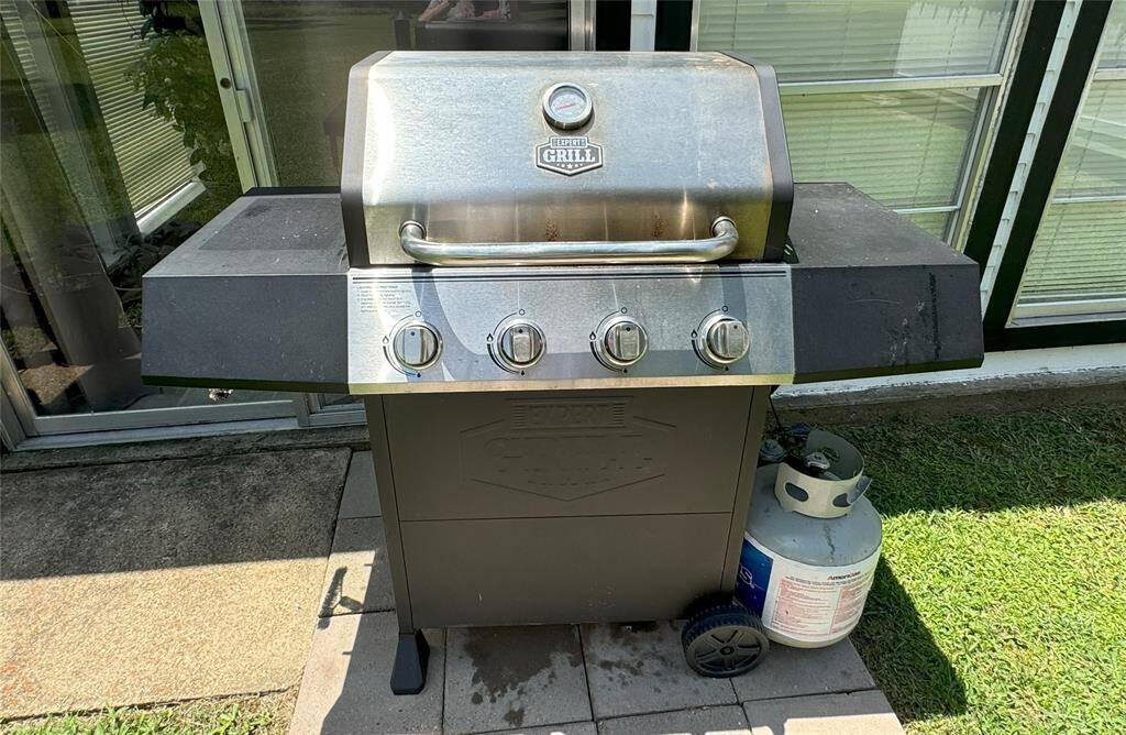 BBQ Pit stays with the home.
