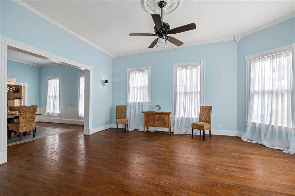 View of this grand livingroom and entry to dining room