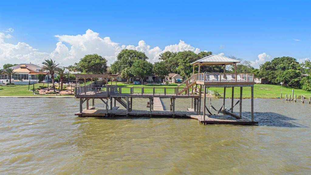 Drone view of boat dock and deck area from the lake.