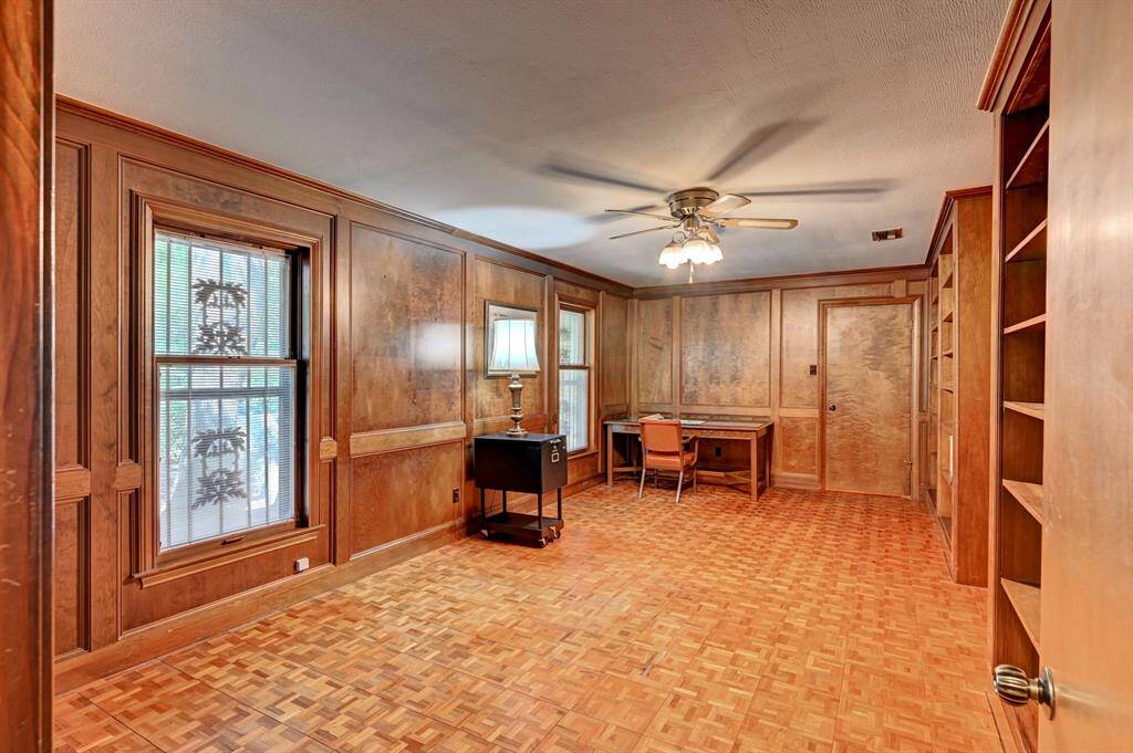 Stunning private study. Impressive mill work layered throughout this room.