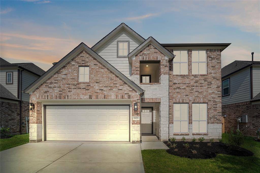 Welcome home to 1955 Scarlet Yaupon Way located in Barton Creek Ranch and zoned to Conroe ISD.