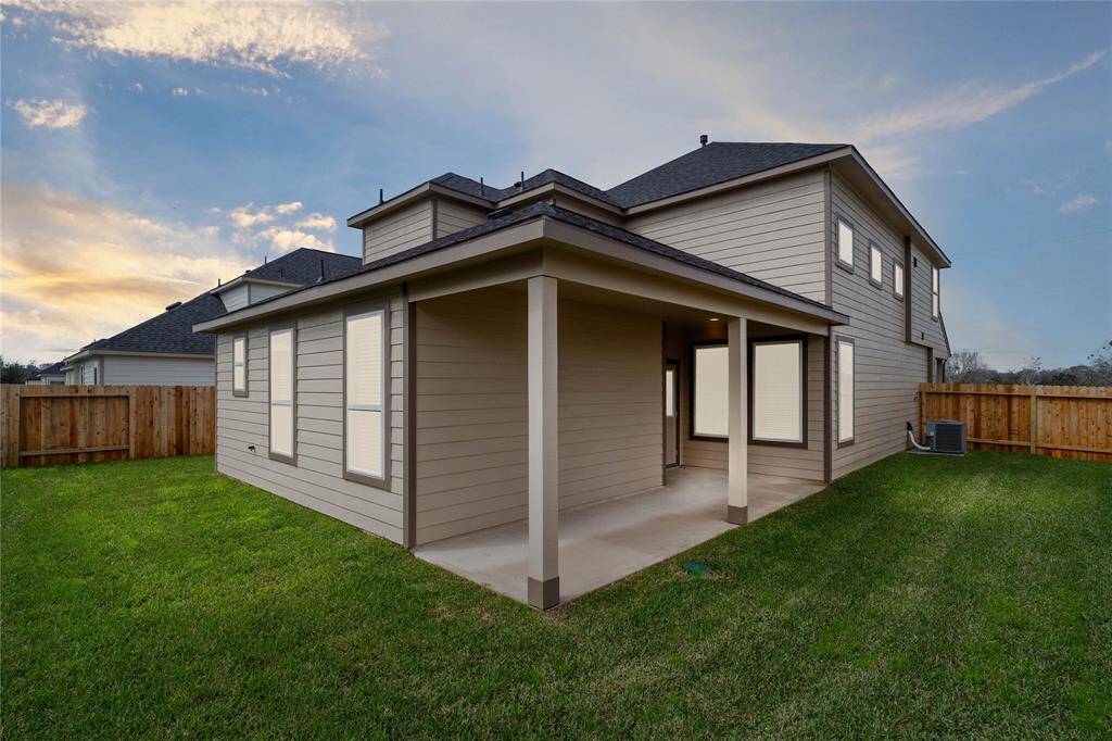 Come and see this spacious backyard with its beautiful covered patio. There is plenty of room for the kids to play and adults to relax! Perfect for your outdoor living space, patio furniture, bbq pit, and so much more. The possibilities are endless!