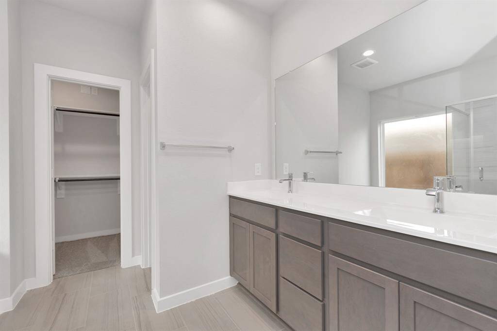 Sample photo of completed home with similar floor plan. Actual colors and selections may vary.