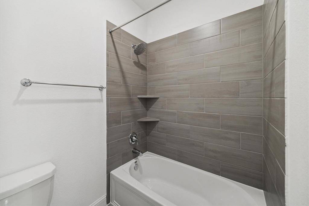 Guest bathroom downstairs separated bath/toilet