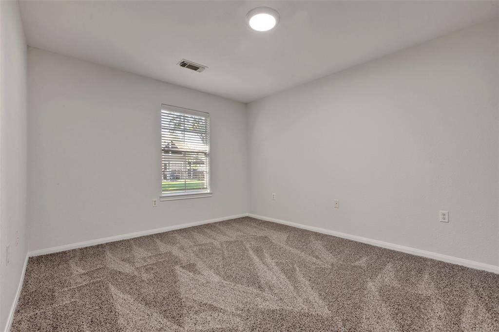 The other downstairs bedroom.