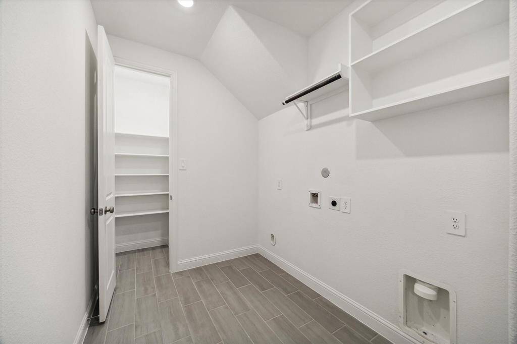 Laundry-room with closet and room for 2nd refrigerator.