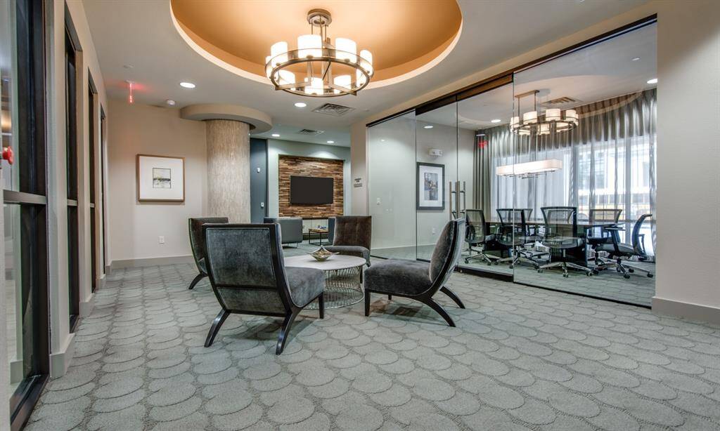The beautifully appointed business center with lounge seating, work stations, high speed WiFi, coffee bar and conference room