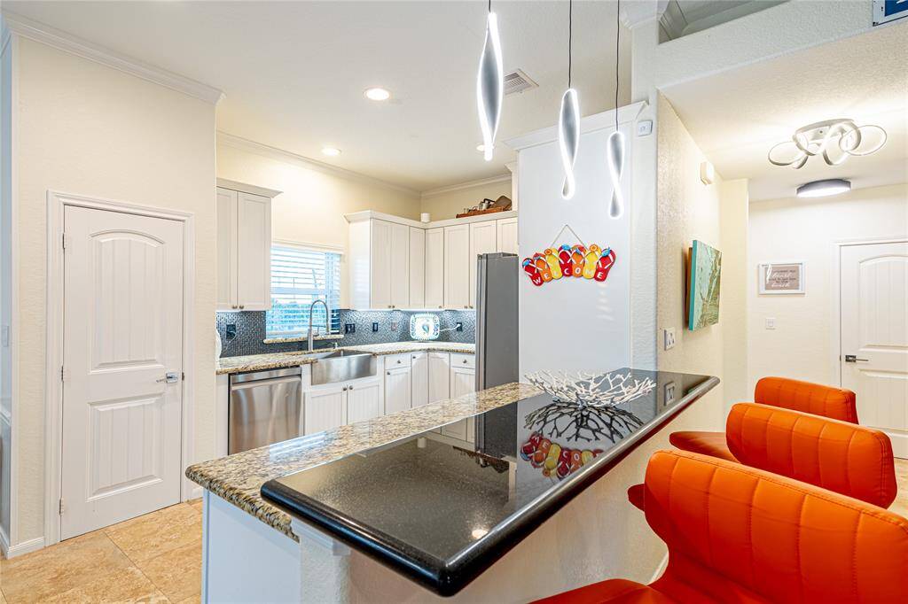 Spa-like primary bathroom with double vanities, walk-in shower, and premium finishes for ultimate comfort.