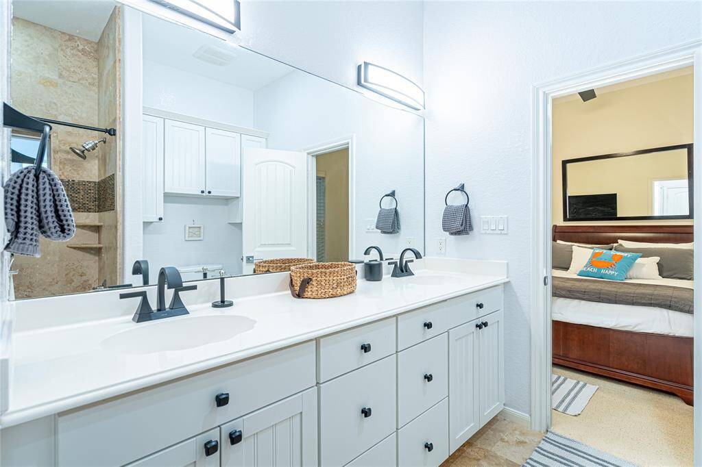 Spacious upstairs game room with built-in wet bar, ice maker, and room for entertainment—perfect for game nights and gatherings.