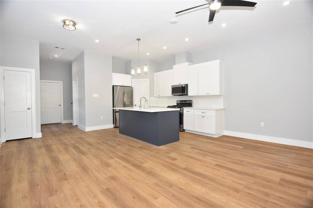 Spacious open floor plan with high ceilings
