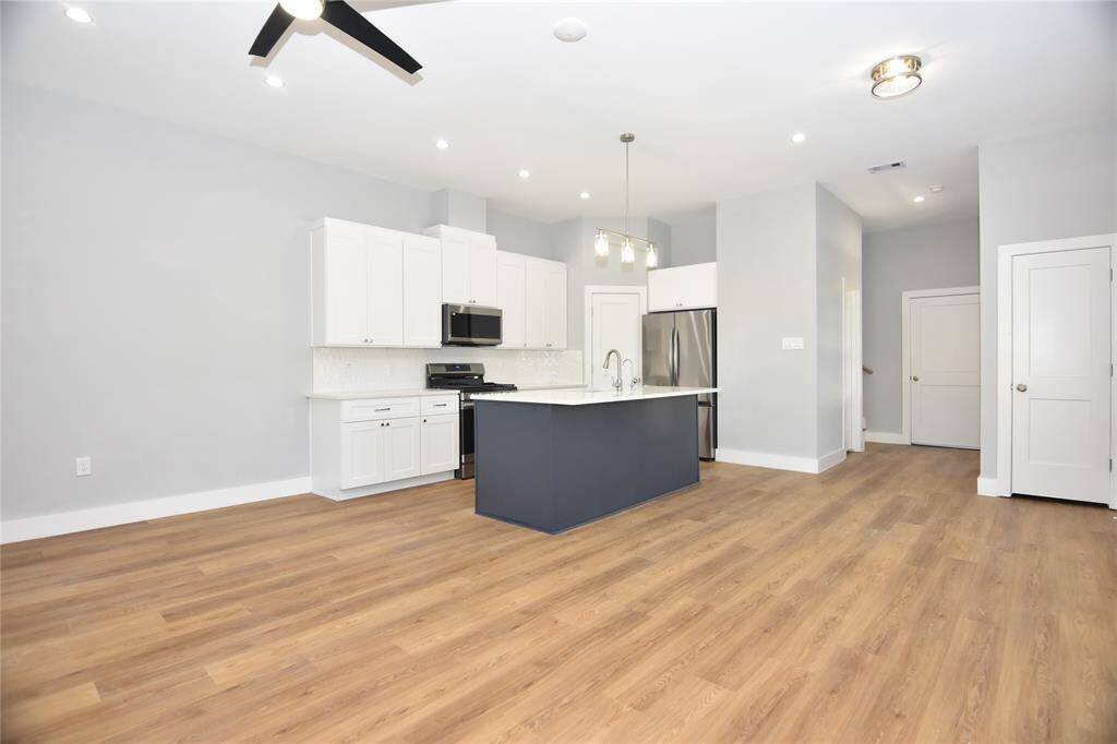 Spacious open floor plan with high ceilings