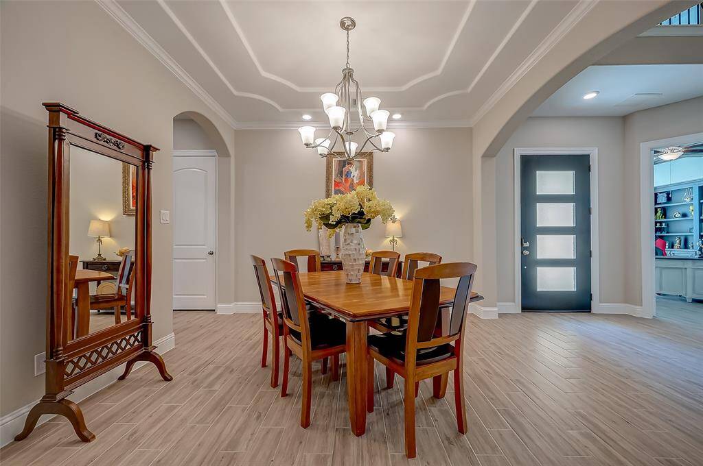 The exclusive inlay ceilings are a testament to exceptional craftsmanship and a true mark of luxury living.
