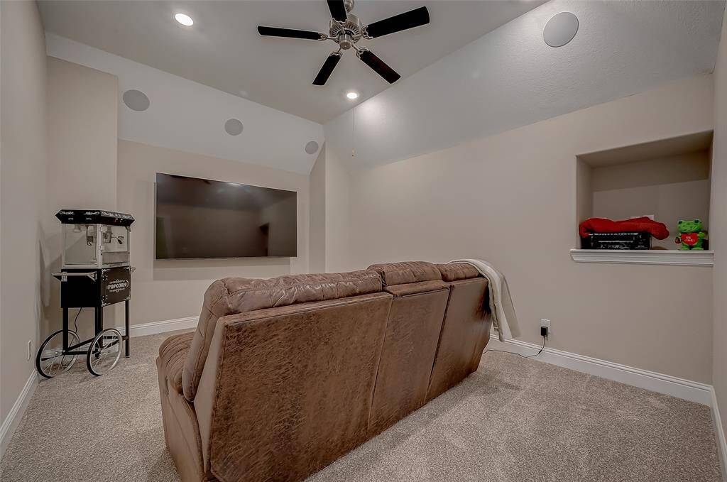 Enjoy movie night in this media room with surround sound.