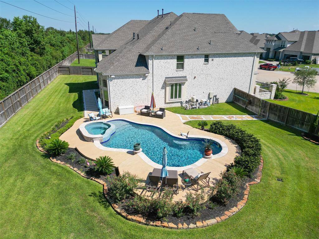Welcome to your own private sanctuary, where sophistication meets serenity. The centerpiece of your new home is a stunning, sparkling pool, perfectly designed to offer both elegance and relaxation.