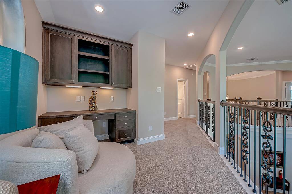 This space is the perfect place, if you need to do homework or study for that big test. Built in desk, cabinets & shelving.