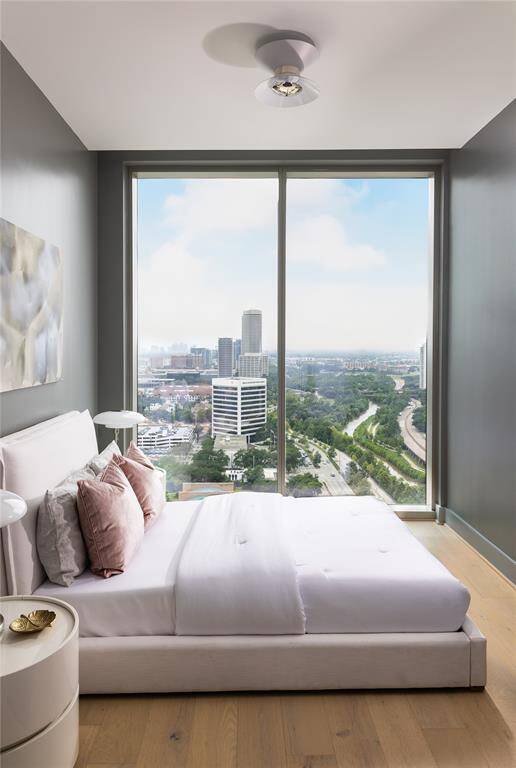 The secondary bedrooms feature floor to ceiling windows with panoramic views.