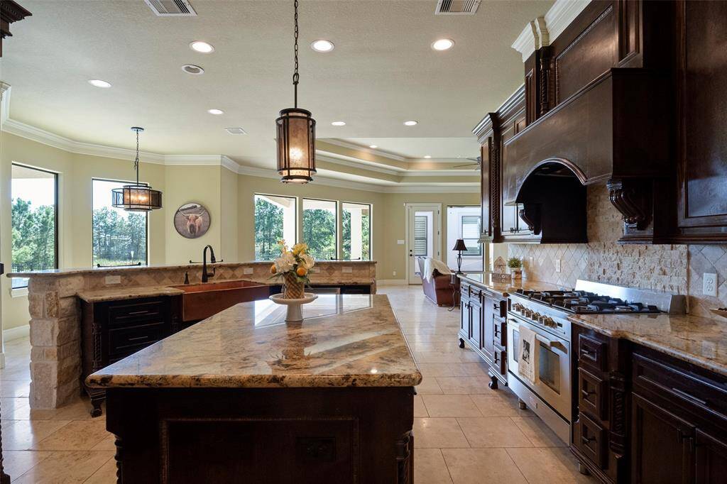 Discover the luxury of a spacious kitchen island, ideal for culinary creations and social gatherings.