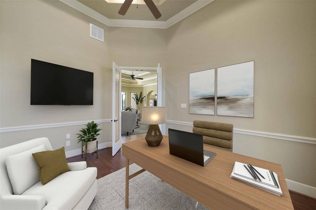 Virtually Staged. Elegantly Styled Home Office Space or could be used as an extra bedroom, work out room.