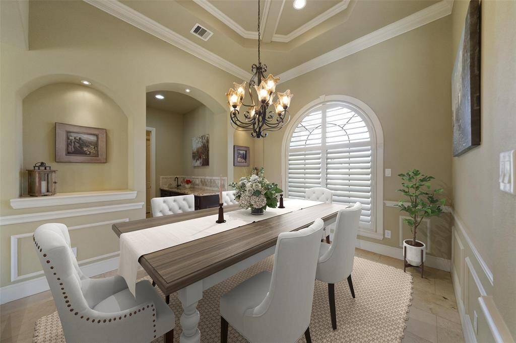 Virtually Staged. Host memorable gatherings in this elegant dining space, complete with a convenient butler's pantry, chic wine bar, and temperature-controlled wine fridge.