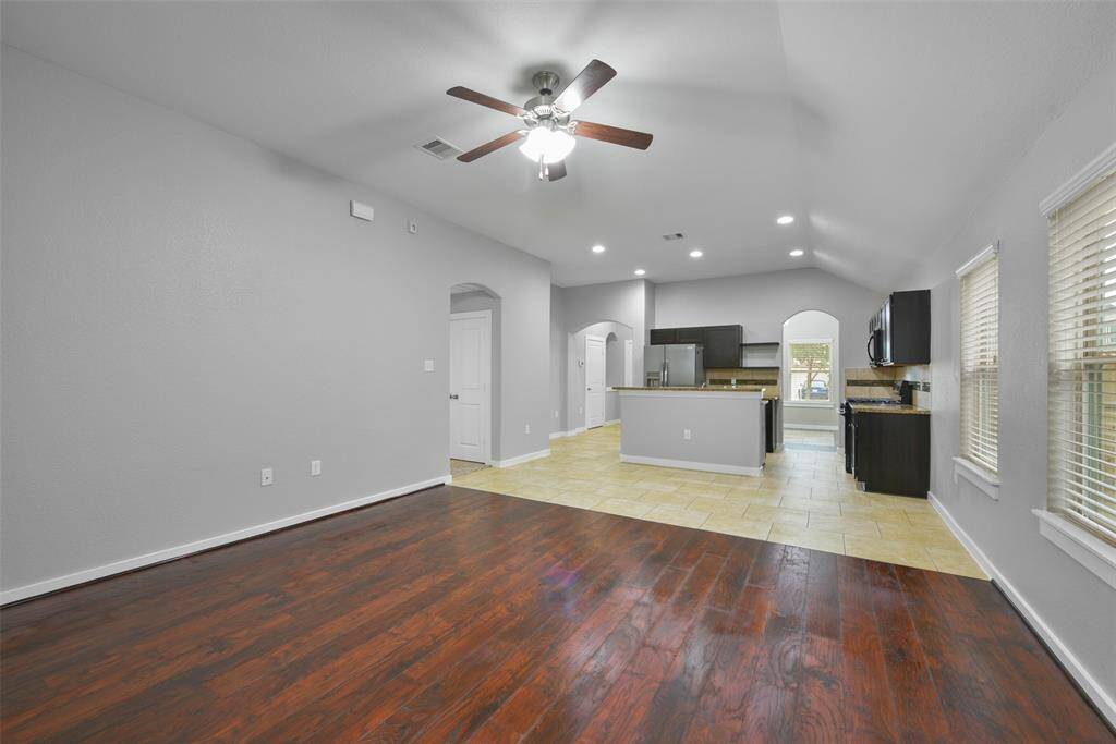 he spacious layout seamlessly connects the living, dining, and kitchen areas, making it an entertainer’s dream.