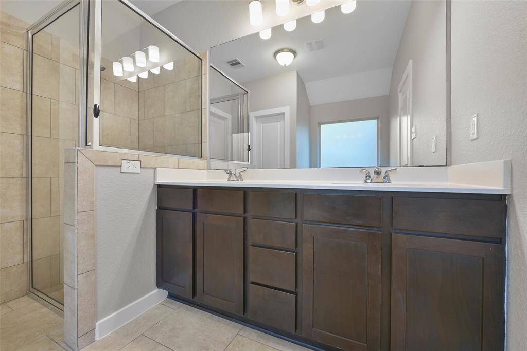 Primary Bathroom has a stand up shower