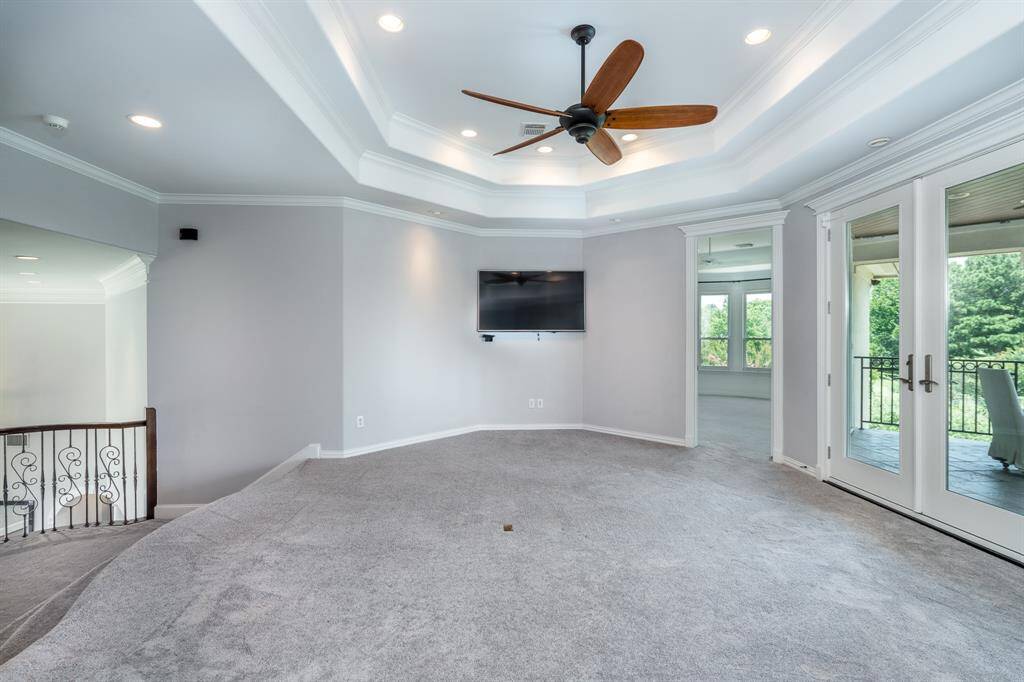 Spacious game room on the second floor for games and having friends over with a half bath nearby.