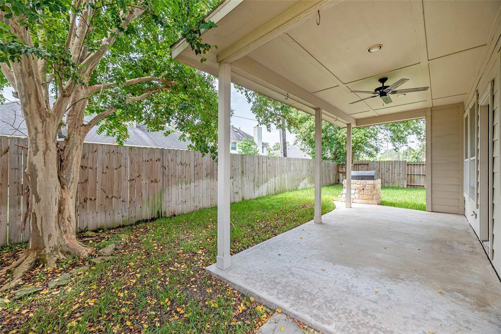 Relax in the shade on the covered patio.